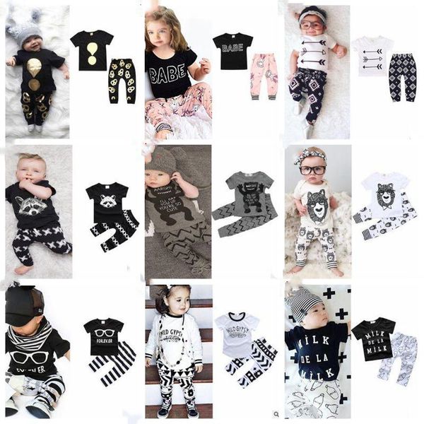 Vestiti della neonata Ragazzo Top floreali Pantaloni Cartoon Set di abbigliamento a righe Camo Lettera Animal Print T-shirt Pantaloni Abiti 23 Style DHL CZYQ5387