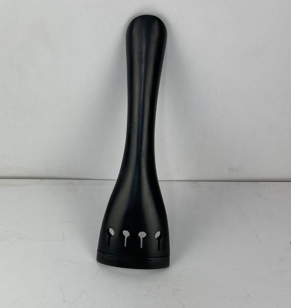

bass.tailpiece. basra string board is elaborately carved from ebony