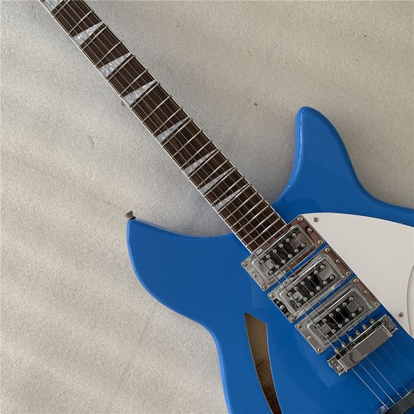

guitar,blue paint with f hole, 325 electric guitar,backer 34 inches