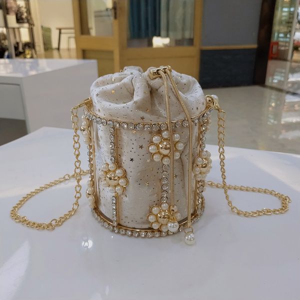 

ins hollow out pearl bucket evening bag women pearl flower handmade alloy metallic clutch bag ladies shoulder bags