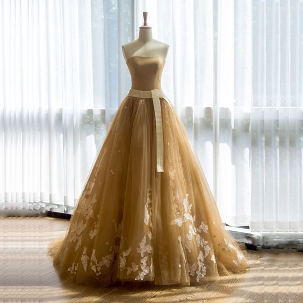 

unconventional strapless tulle champagne colored wedding dresses with 3d applique dream wedding dresses sash bodice bridal gowns, White