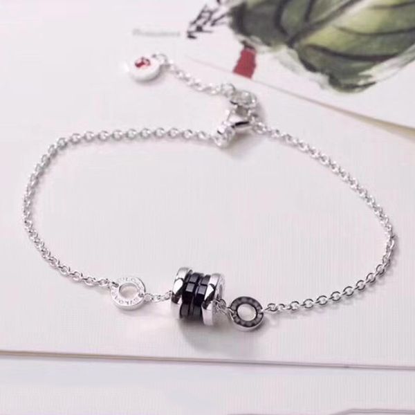 

trendy men's net red cnc seiko s925 silver pure plated platinum small red bracelet female black ceramic charity fund female bracelet, White