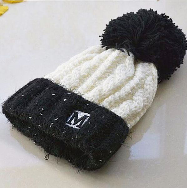 

outdoor hats autumn and winter new ladies two-color curling hair ball wool fashion earmuffs knit hat, Black;white