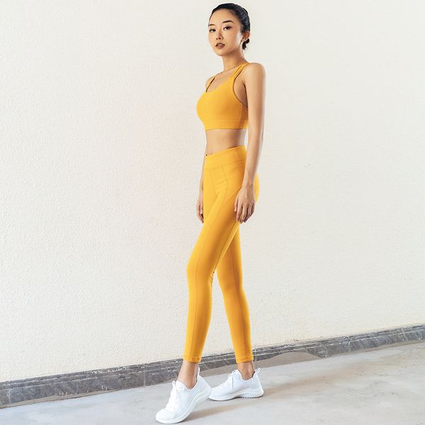 

2020 designer women yoga suit europe and america female cross beauty back shirt quick-drying pantyhose female two-piece suit 3 colors s-xl