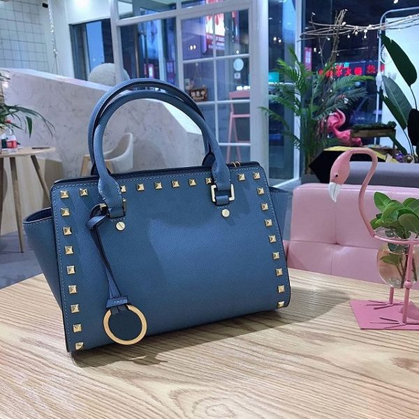 

моднй бѬенд женка ђмка евѬопейкий и амеѬиканкий дизайнеѬ ђмка заклепки из