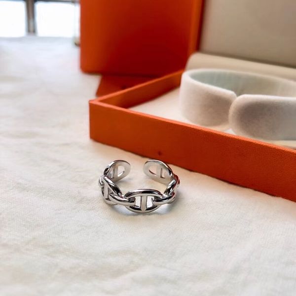 

Фирменный знак S925 чистого серебра Париж дизайн полые кольца и логотип открыл любителей кольцо для женщин подарок PS7647