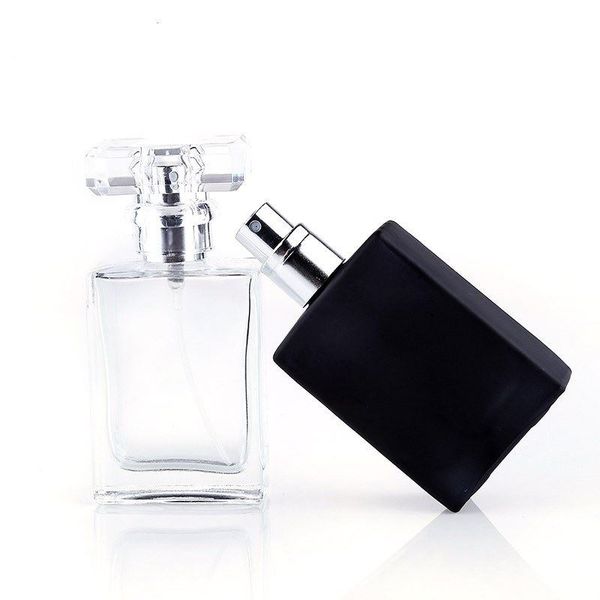 

Whole ale 30ml portable tran parent black gla perfume pray bottle with aluminum atomizer empty co metic container
