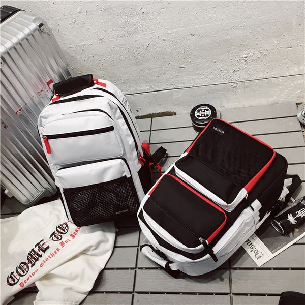 

korean version of the large-capacity couple shoulder bag street boys and girls backpack multi-layer travel backpack computer bag