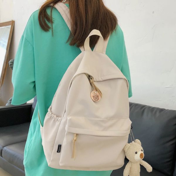 

dcimor waterproof nylon women backpack female solid color schoolbag for teenage girls travel back bag book mochilas