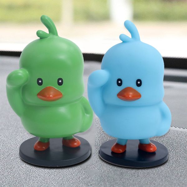 

shaking head small yellow duck inside the car decoration cartoon toy car windowsill decoration nr-shipping
