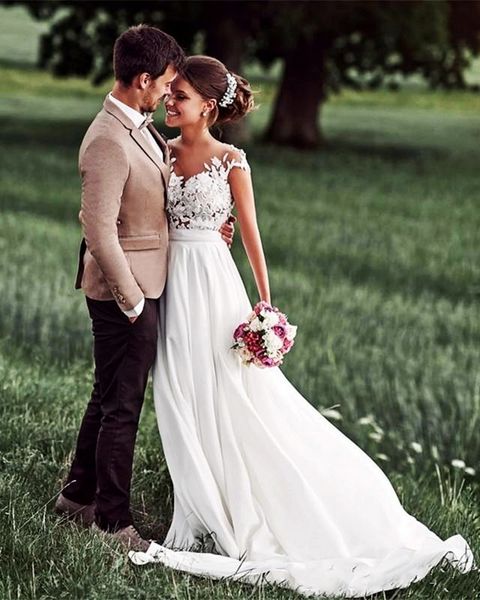 

gorgeous beach wedding dresses sheer neck cap sleeves appliques lace chiffon floor length backless wedding dresses white bridal dresses