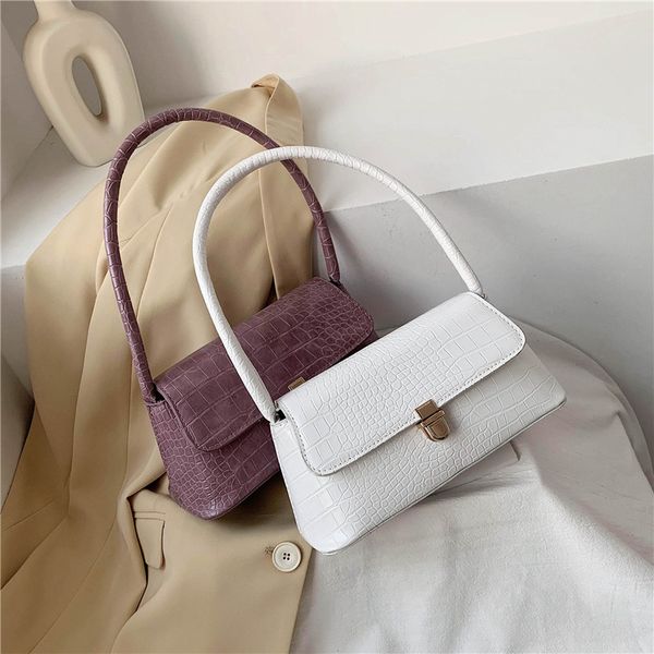 

new crocodile pattern clutch bag 2020 korean version of the wild shoulder bag niche mortise lock armpit french