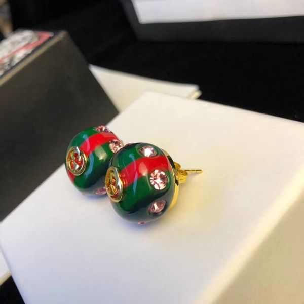 

Серьги Top Brand name круглой зеленой и красной эмали с розовым бриллиантом Серьги 18 К п