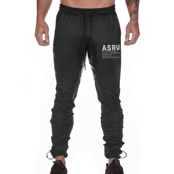 

Новые брюки мужчина Европа и Соединенные Штаты прилива бренд сплошного цвета Тонкого Комбинезон открытого луч роты спортивных ноги брюки мужчин