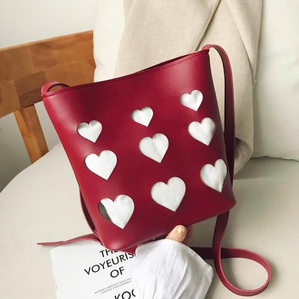 

fashion hasp bucket bag for women 2019 fashion shoulder bucket bag simple hollow heart soft leather cross body bags #15