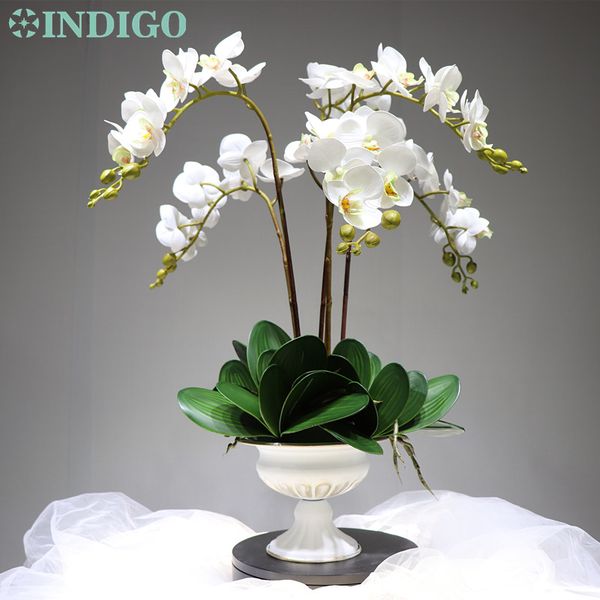 

indigo- (5 flower + 9 leaves + vase) white orchids flower arrangment real touch office table decoration ing