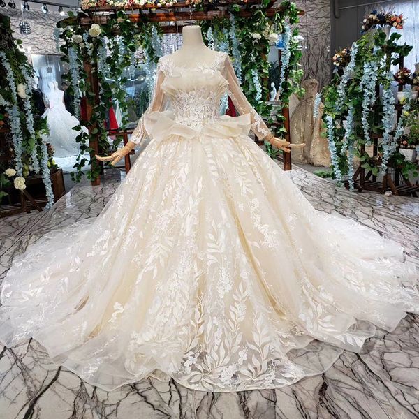 

2019 latest lebanon wedding dresses shell chest illusion o neck long tulle sleeve ruffle lace up back sequins applique pattern bridal gowns, White