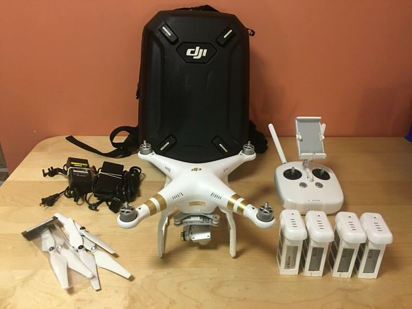 

Dji phantom 3 profe ional quadcopter drone kit with extra