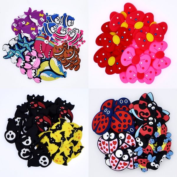 

festival gifts for kids bowknots/halloween bat/cakes/sea animals/outer space rockets/ladybird/glasses shoe/wristband ornaments, White;pink
