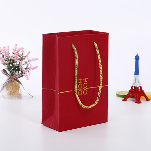 Красный бумажный подарок кладет двойные мешки в мешки Благосклонностей свадебного банкета счастья с ручкой конфеты помадки упаковывая мешок
