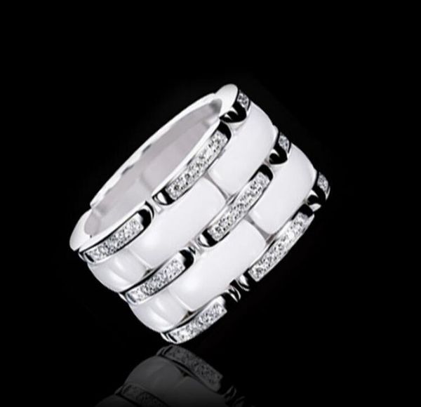 Новое прибытие Fashion Lady 316 Titanium Steel Black White Ceramic Setting Three Rows Diamond Wedding Engagement 18K Gold Plated Rings Size5-11