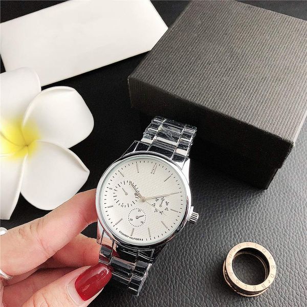 

new luxury men's and women's quartz watches simple and popular wild personality watches ing, Slivery;brown