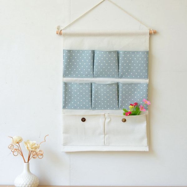 

fresh small dot cotton and linen hanging bag multi-layer multi-functional storage bag behind the bedroom door wall storage