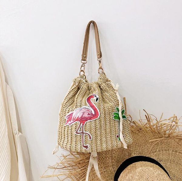 

factory direct sales of women handbag new lace fashion bucket bag woven summer sweet lovely pearl decoration new straw beach ba, Black;red