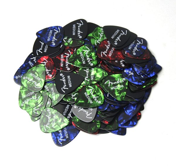 

lots of 100pcs medium 0.71mm guitar picks plectrums celluloid with print for acoustic guitar
