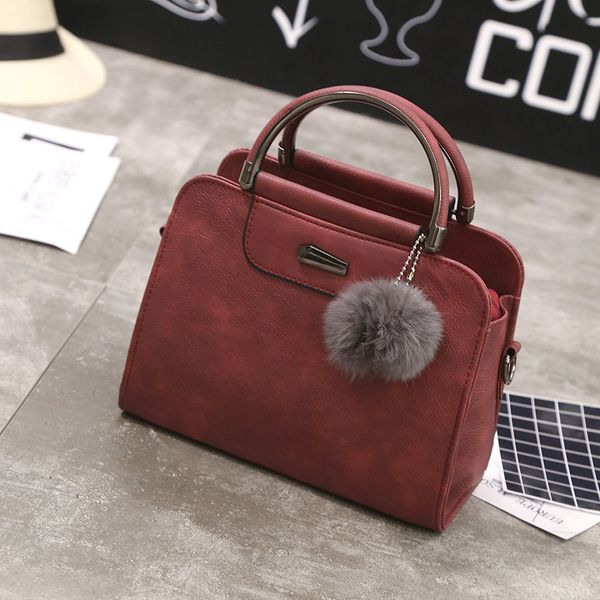 

2020 new european and american fashion women's bag semicircular iron edge hairball shoulder bag crossbody