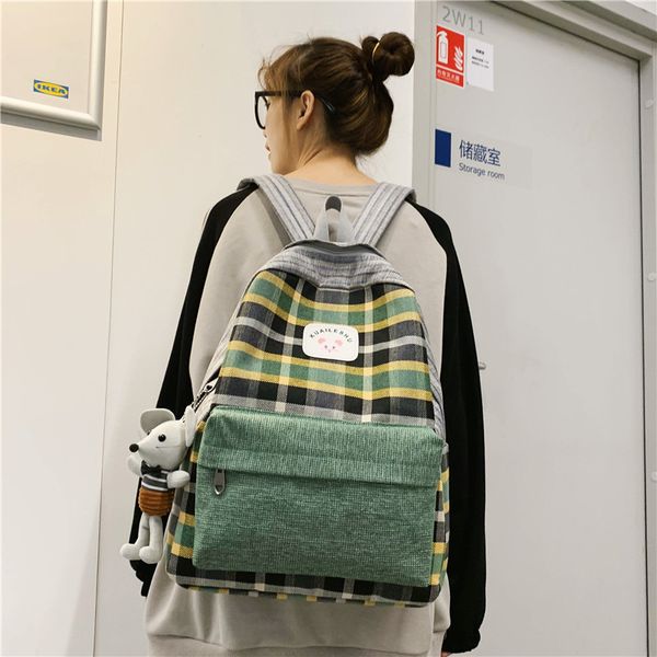 

ins wind bag female college students backpack high school sen department ancient feeling grid belt pendant backpack