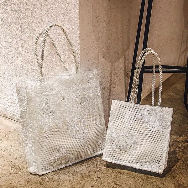 

sell fashionable lace hand shopping bag, embroidered pattern shoulder bag, simple square bagsize :36*34 cm,24.5*24.5cm