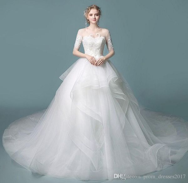 

new layer ruffle skirts backless wedding dresses illusion long sleeves appliqued ball gowns bridal wedding gowns, White