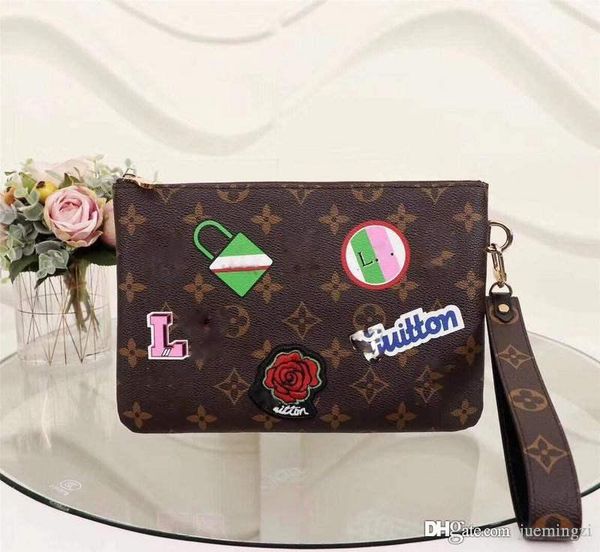 

lovuitto luis vuiton city pouch clutch bag with patches monogram m63447 size:16.0 x 23.0 x 0.3cm