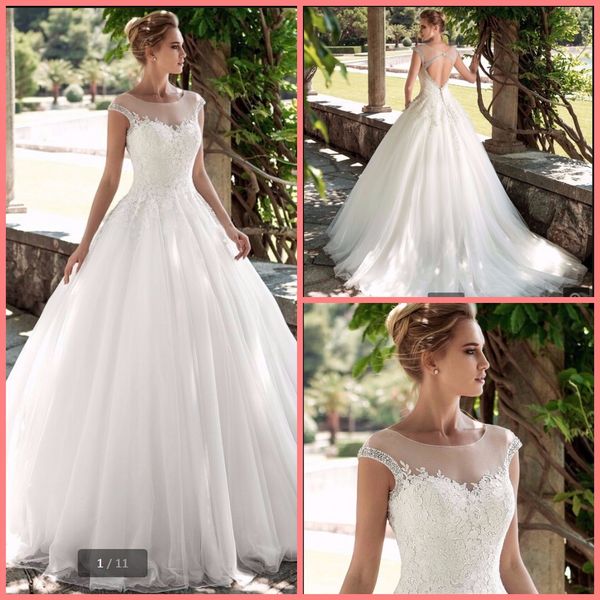 

2020 new designer lace appliques ball gown wedding dress open back heavily beading stylish bridal gowns floor length robe de soiree, White