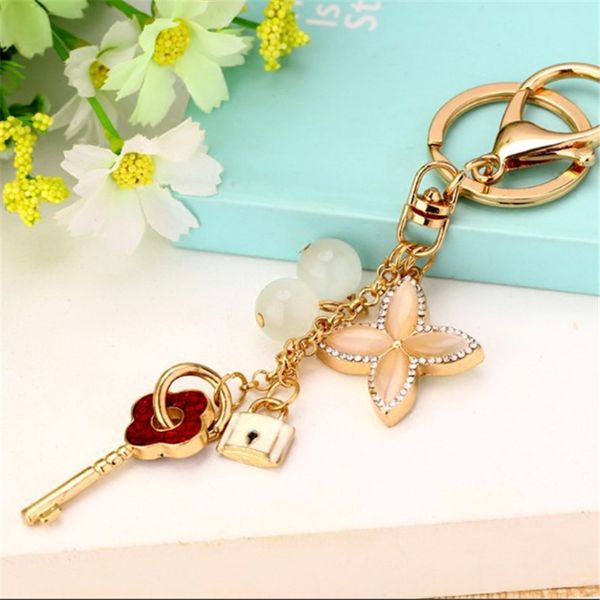 

дизайнер милый кристалл брелок горный хрусталь клевер автомобиль брелок женский творческий милый цветок сумка кулон цепи брелок, Silver