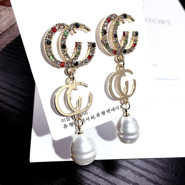 

south korea's new s925 silver pin alphabet personality wild full diamond pearl earrings net red ear round tide suitable for round face