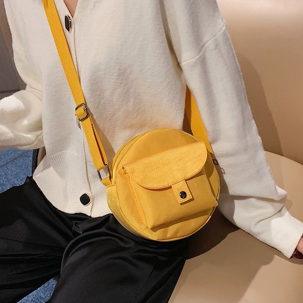 

mori girl small fresh female bag japanese small bag cute nylon shoulder solid color round