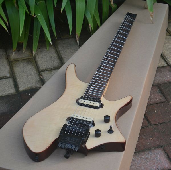 

new fanned fret headless electric guitar with mahogany body in natural a bridge