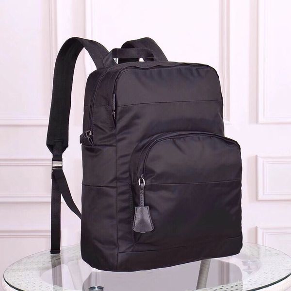 

fashionable classic waterproof nylon oxford wholesale large spinning capacity school notebook backpack men's lightweight travel backpac, Red;black