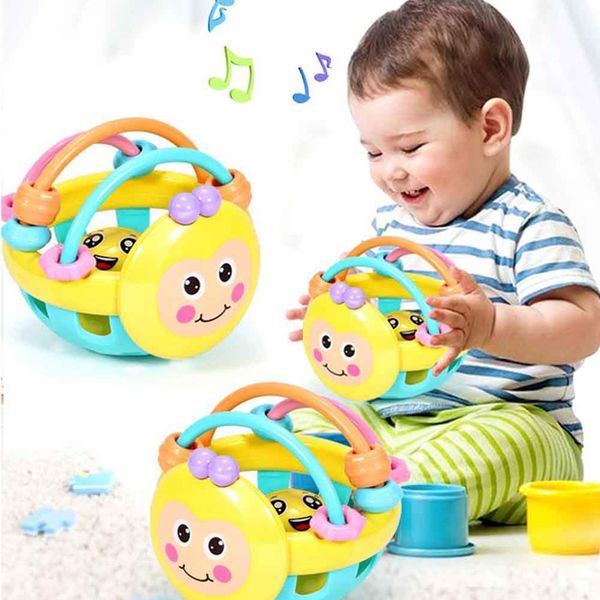 

soft rubber juguetes cartoon hand knocking rattle dumbbell early educational for kid handbell baby toy 0-12 months
