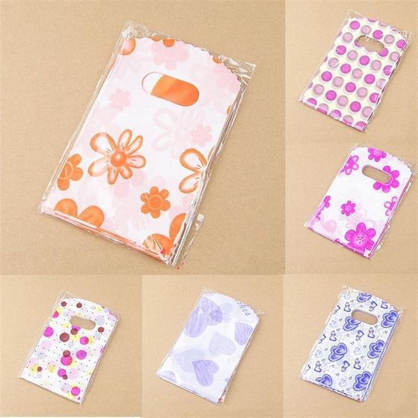 

оптовая продажа-100 шт. лот пластиковые упаковочные пакеты с ручкой небольшие подарочные пакеты 14x9cm