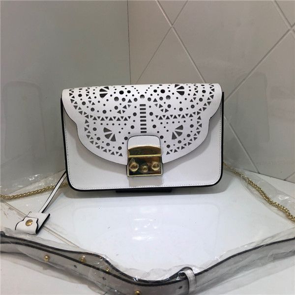 

in 2020 the new joker real leather classic butterfly hollow diagonal small square bag chain leisure buckle shoulder bag