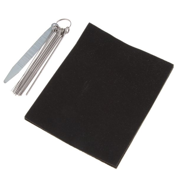 

acoustic guitar parts file nuts with sand paper