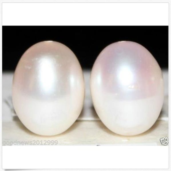 

a pair of 13mm natural south sea white loose pearl half drilled