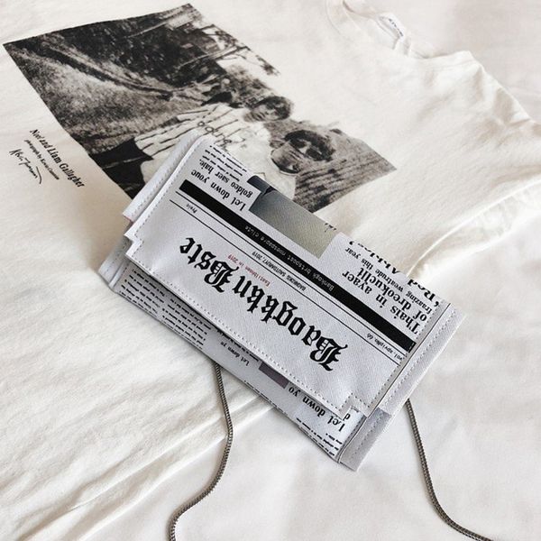 

2020 women's bag fashion creative artificial leather newspaper envelope hand-held horizontal shoulder bag sale