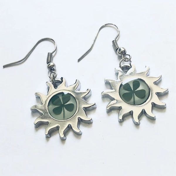 

yqtdmy vogue brand four leaf clover charming sun style design earring, Silver