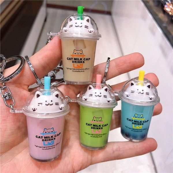 

1 pcs cute creative cartoon milk cup cat car keychain liquid crystal quicksand sequin key ring bag pendant for women, Silver