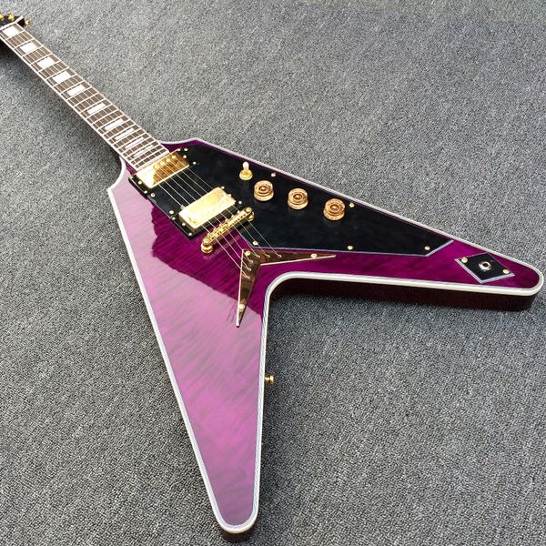

custom trans purple flame maple flying v electric guitar string thru body bridge, black pickguard, gold hardware, white mop block inlay