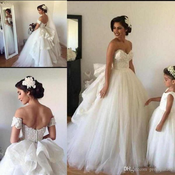 Ultimi abiti da sposa in pizzo con scollo a cuore e scollo a cuore con perline in pizzo soffice in tulle Abiti da sposa principessa su misura